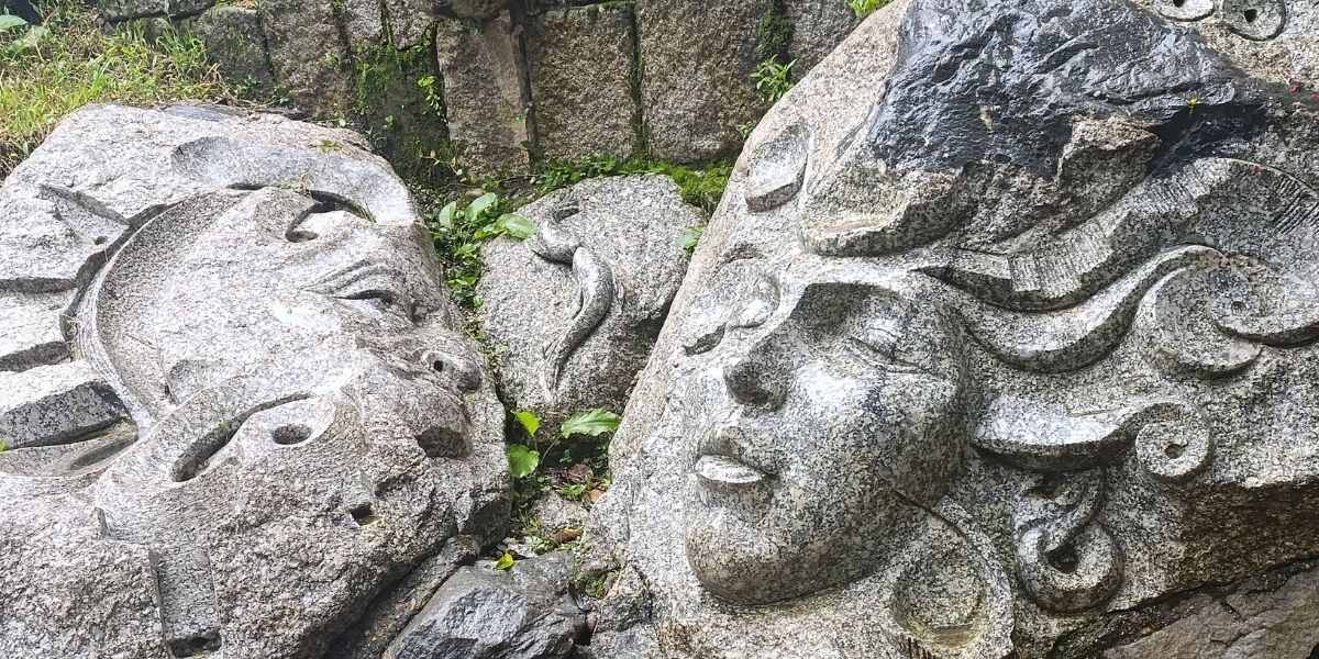 stone sculptures in machu picchu town